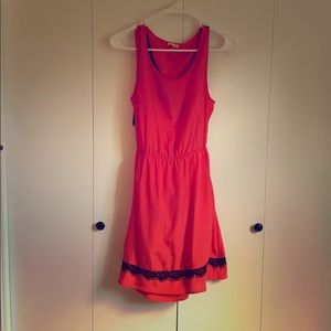 Hot coral and black dress
